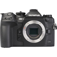 Olympus OM-1 + M.Zuiko Digital ED 12-40 mm Pro II - Vue de face sans objectif