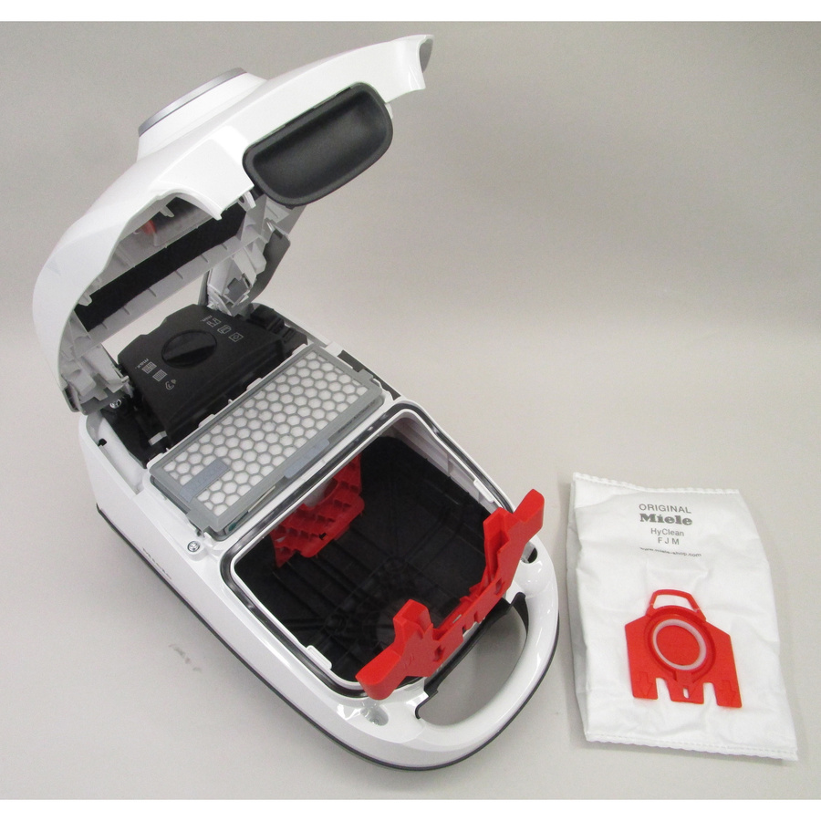 Miele Compact C2 Silence EcoLine SDRK5 - Sac à poussières sorti