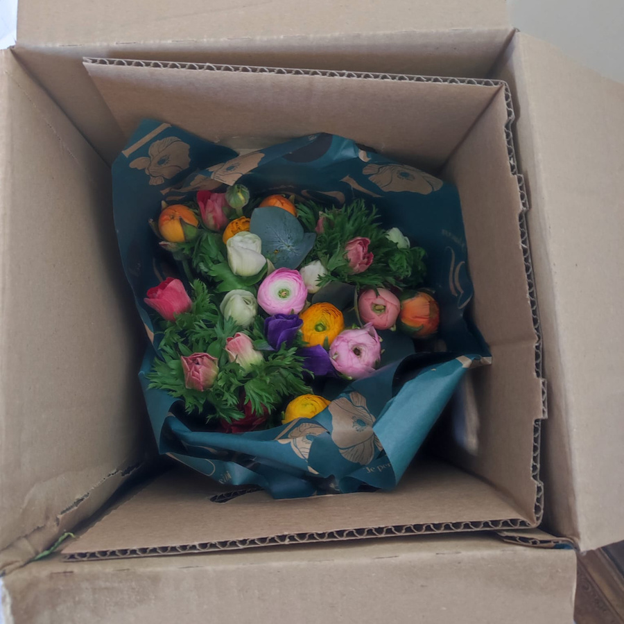 Interflora.fr  - Livraison par un transporteur.