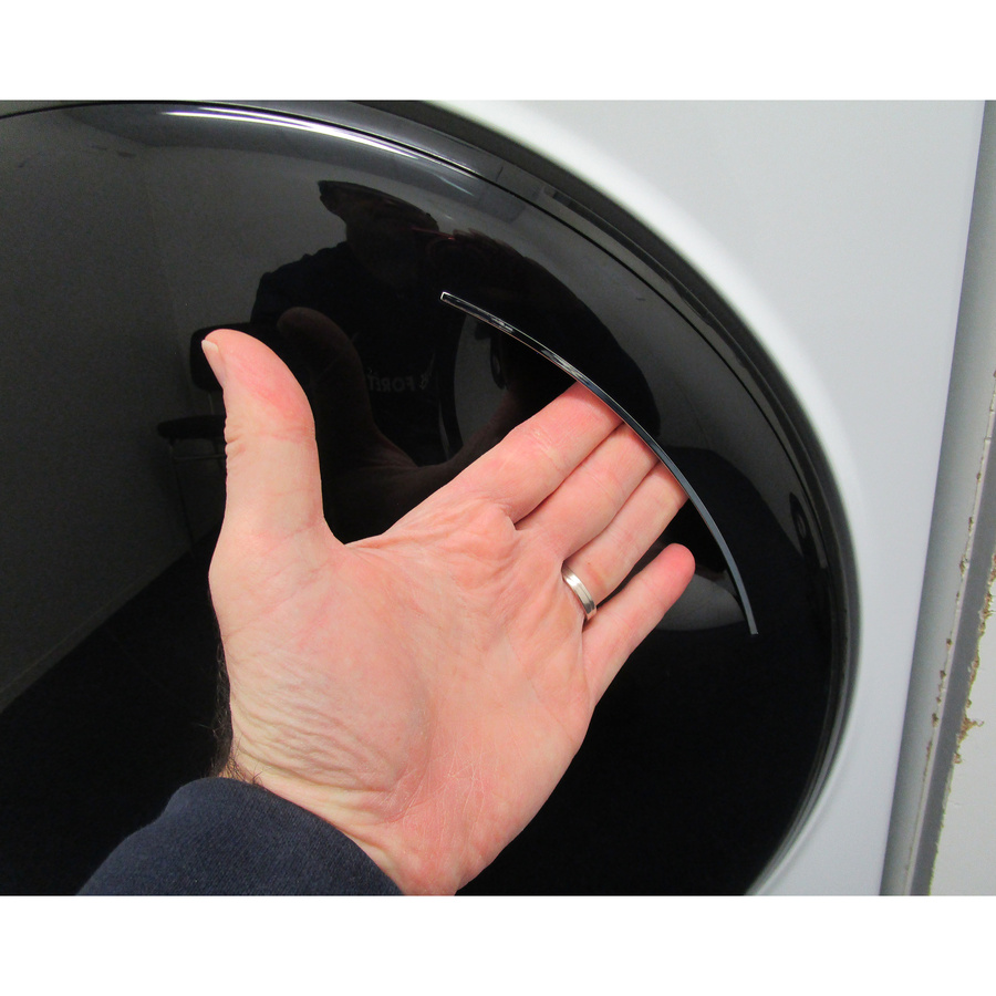 Haier HWD100-B14939-FR - Poignée d'ouverture du hublot