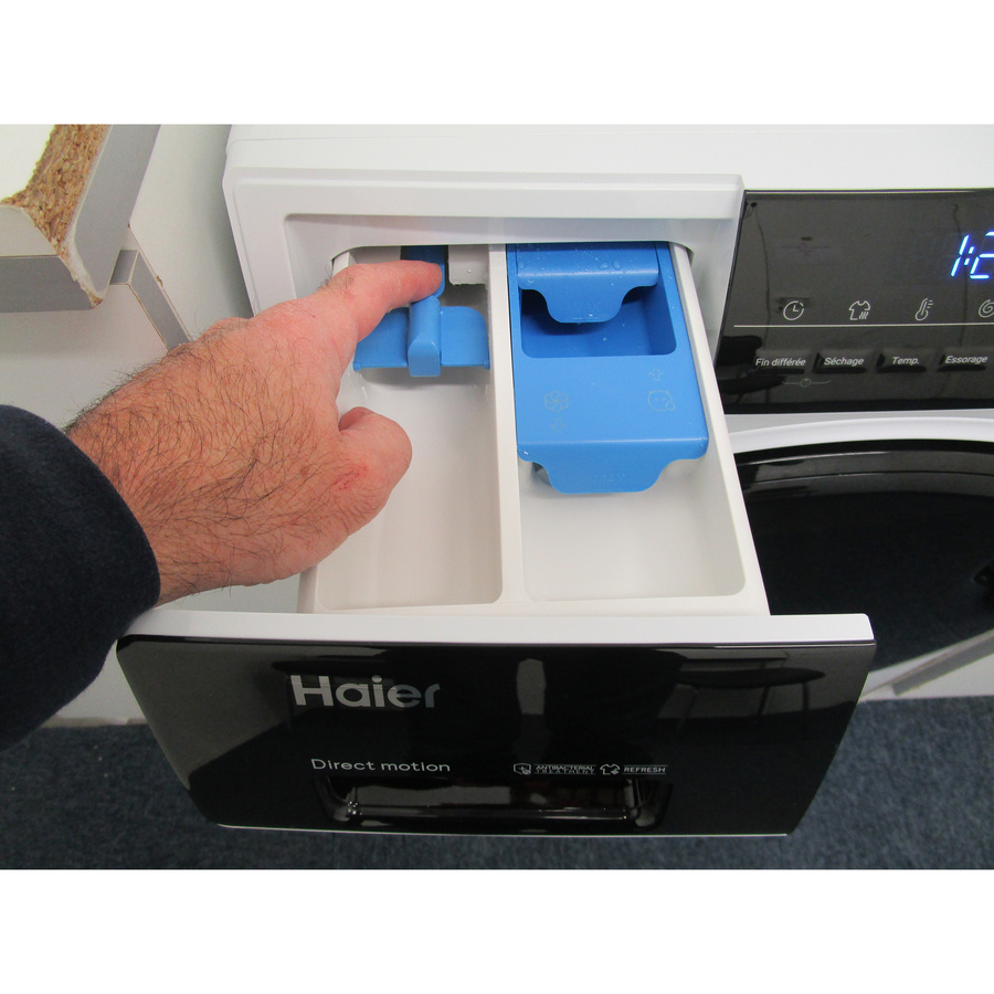 Haier HWD100-B14939-FR - Bouton de retrait du bac à produits