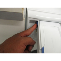 Electrolux EW9FI71014FC - Bouton de retrait du bac à produits
