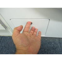 Miele WCA 120 WCS - Ouverture de la trappe du filtre de vidange