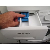 Siemens WU14UT60FR - Bouton de retrait du bac à produits