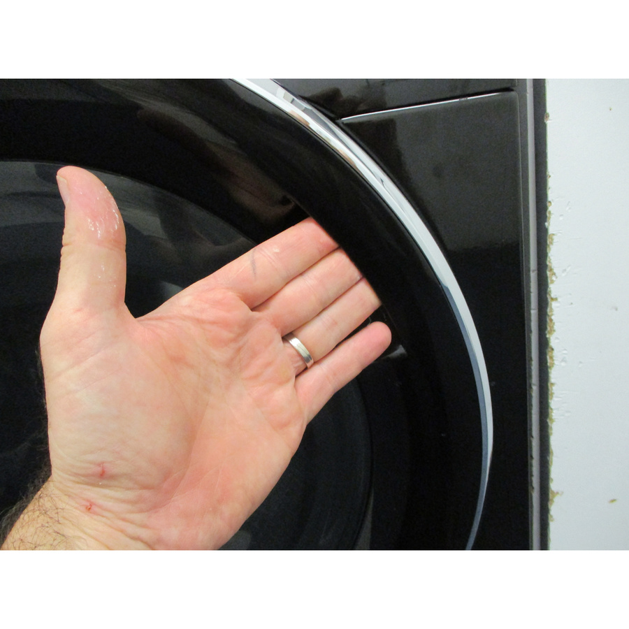 Candy RP586BWMBCB/1-S - Poignée d'ouverture du hublot