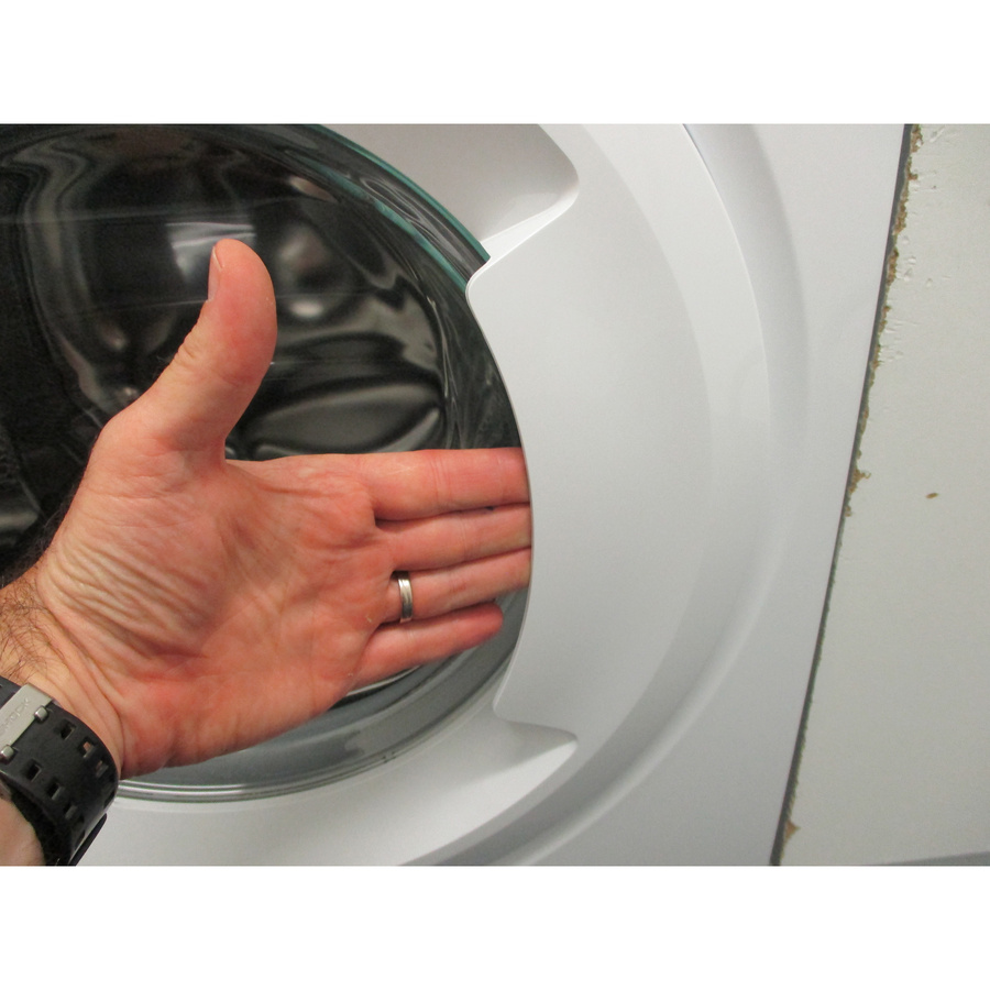 Faure FWF1422A32 - Poignée d'ouverture du hublot