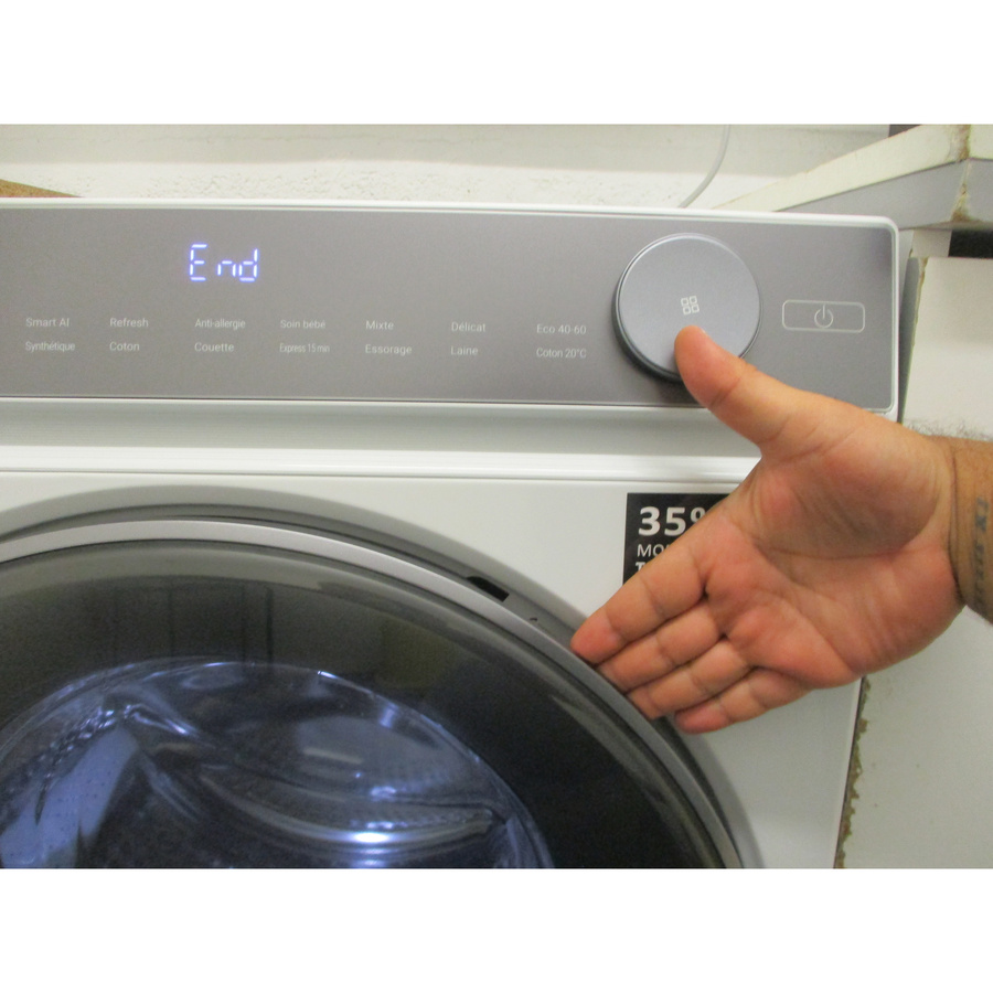 Haier HW90-B14367U1-FR - Poignée d'ouverture du hublot