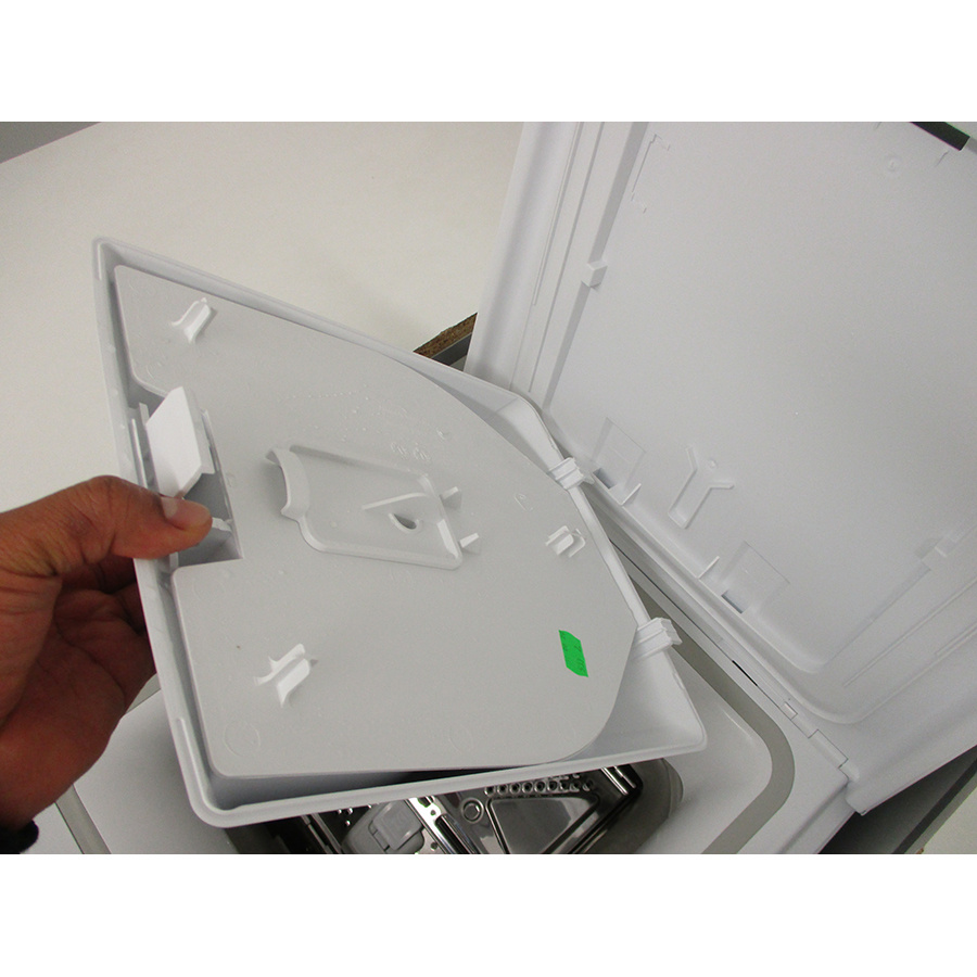 Indesit BTWS60300FR/N - Retrait du bac à produit