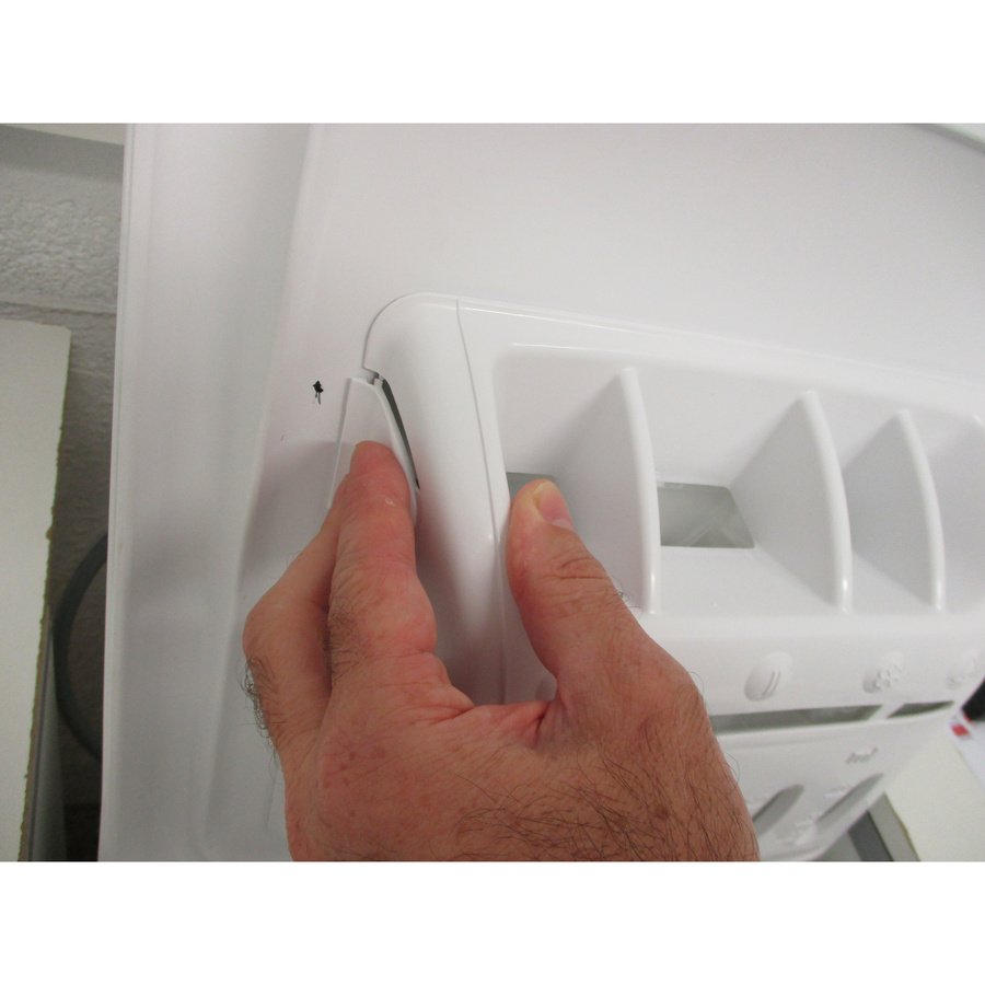 Vedette VLT612E2 - Bouton de retrait du bac à produits