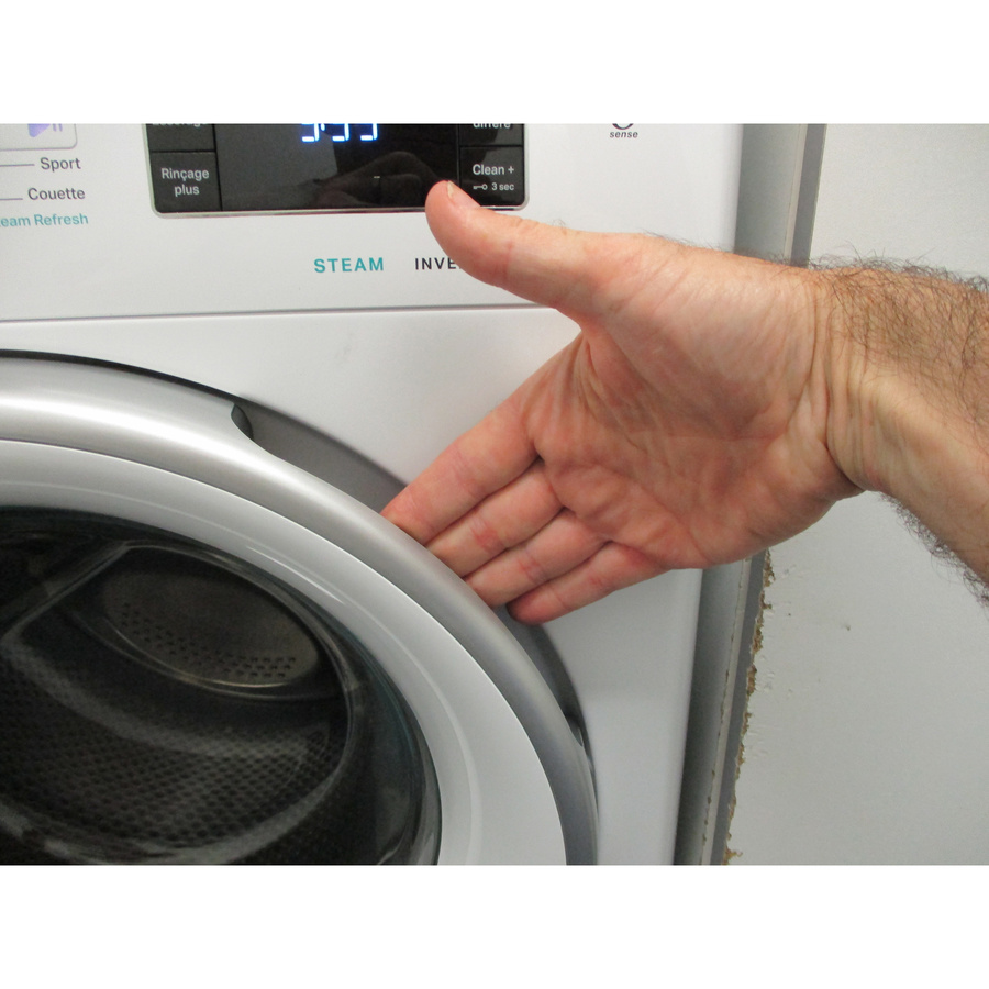 Whirlpool FFB10469SVFR - Poignée d'ouverture du hublot