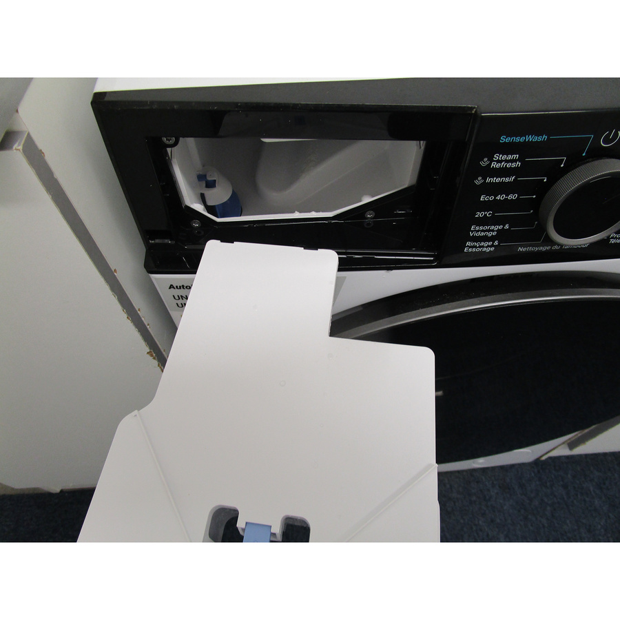 Whirlpool WPM27WADSFR - Retrait du bac à produit