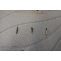 Tempur Form Original Medium  - Test d'inflammabilité : trois cigarettes sont allumées et placées sur le matelas